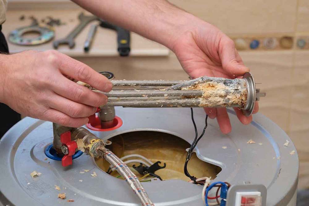 sediment buildup in a traditional water heater