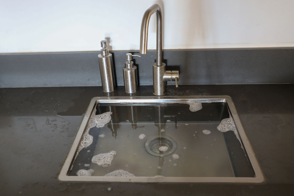 kitchen sink with standing water